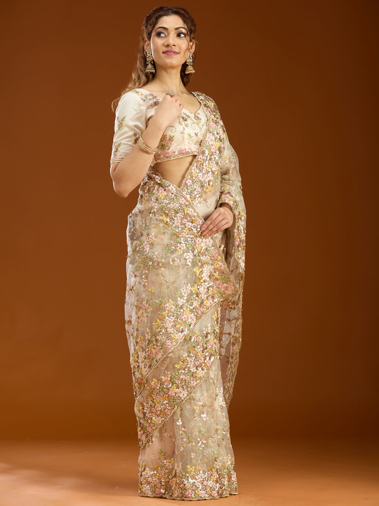 Cream Net Sequins Saree With Matching Blouse Piece
