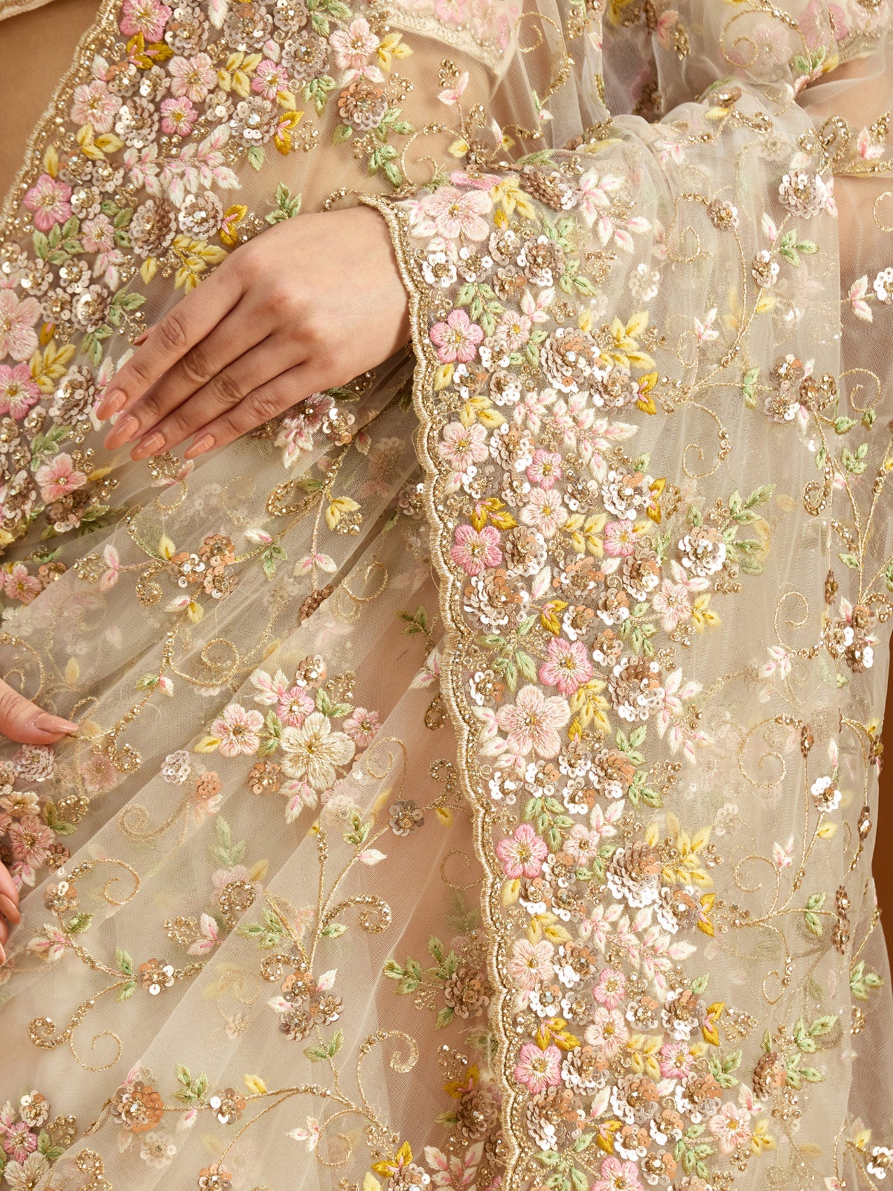 Cream Net Sequins Saree With Matching Blouse Piece